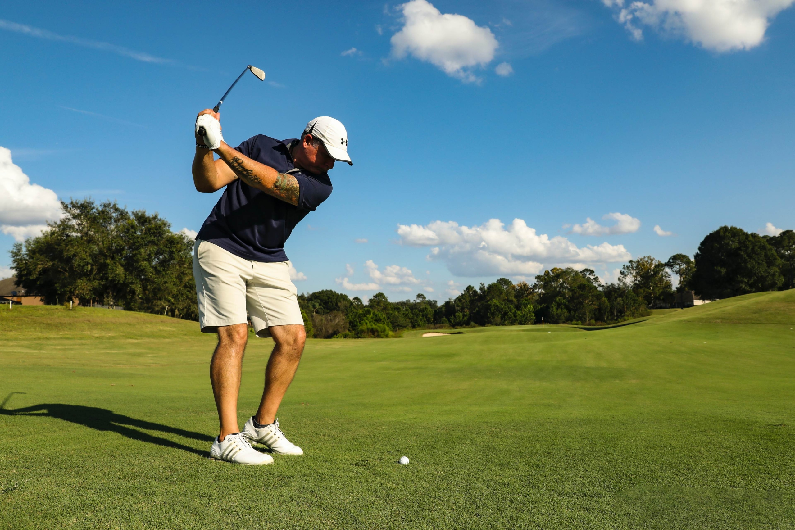 A golfer swinging a golf club