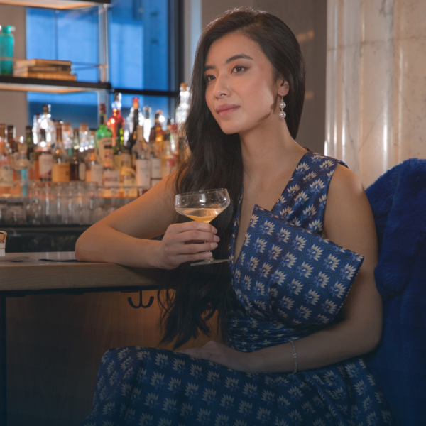 woman sitting at a bar