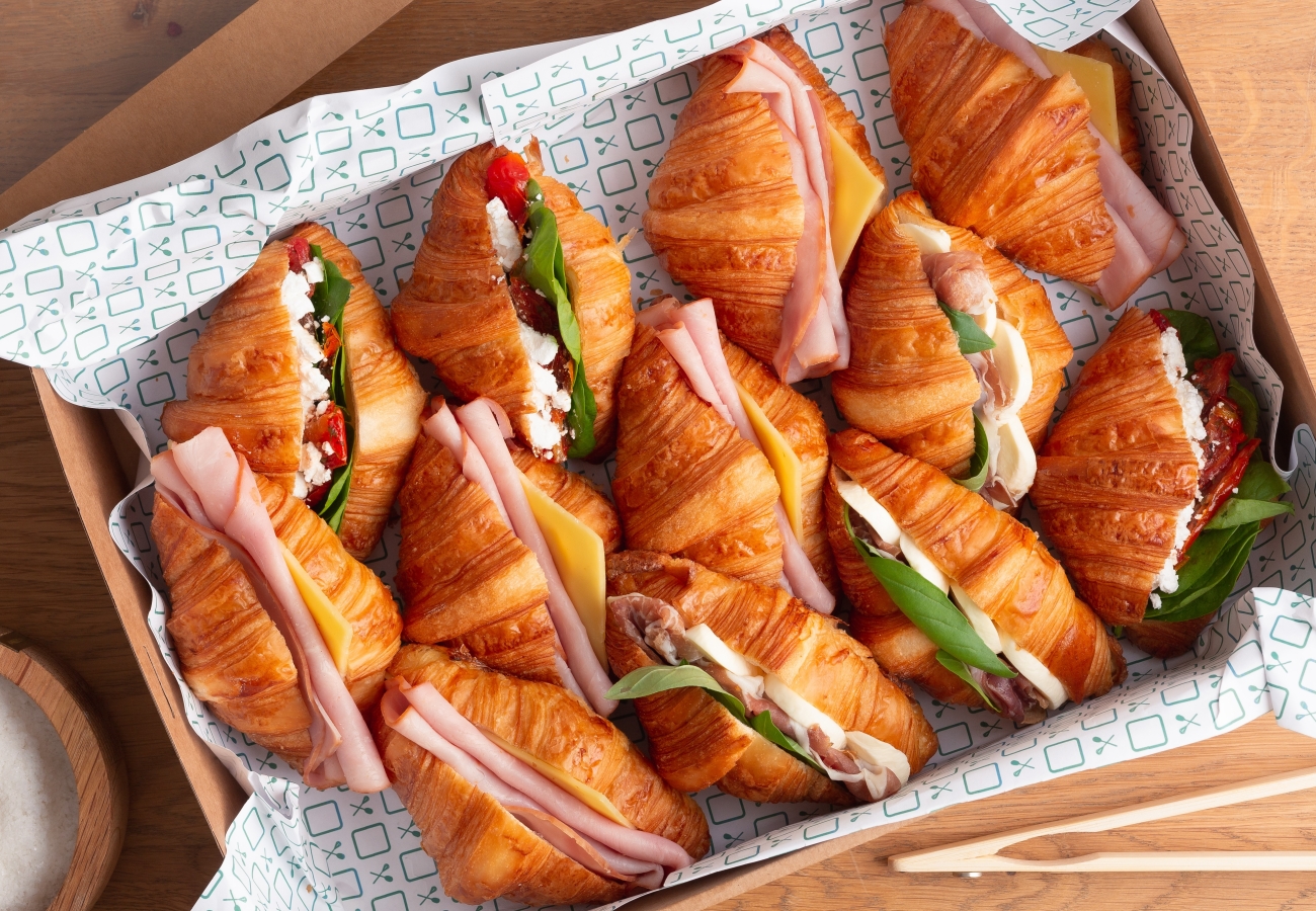 Croissant sandwiches in paper box